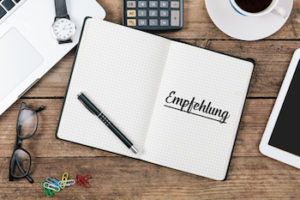 Plus500 Kalender mit Aufschrift unsere Empfehlung